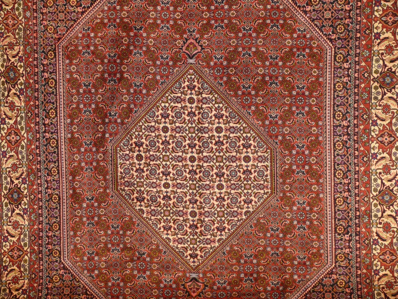 Persian Bijar Rug - Close up of medallion, featuring intricate geometric patterns and floral motifs