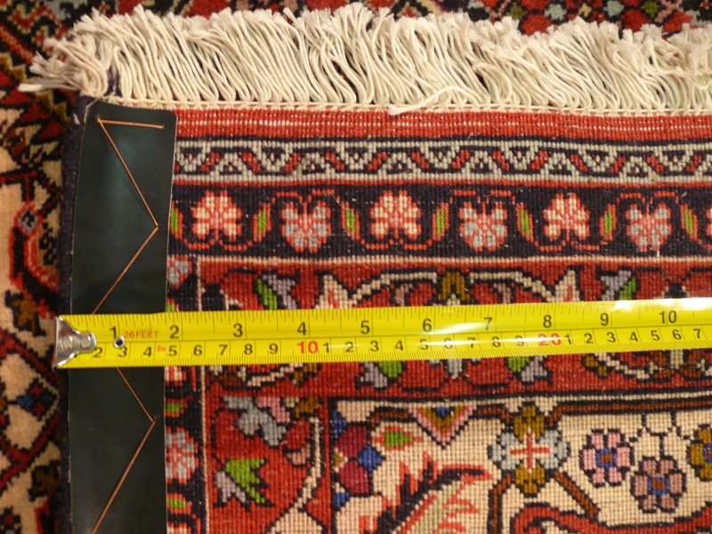 Close up picture of the back of a 8x11 Persian Bidjar Rug