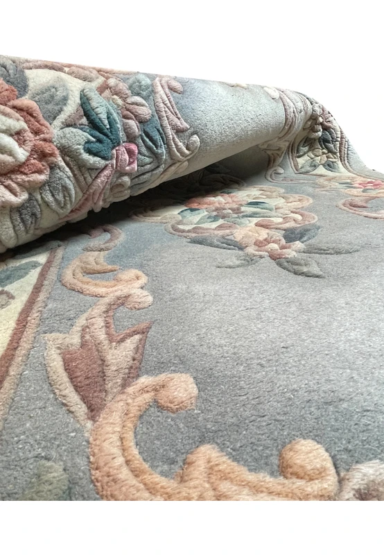 vegetable dyed colors and organic thick wool of a 3x5 art deco rug