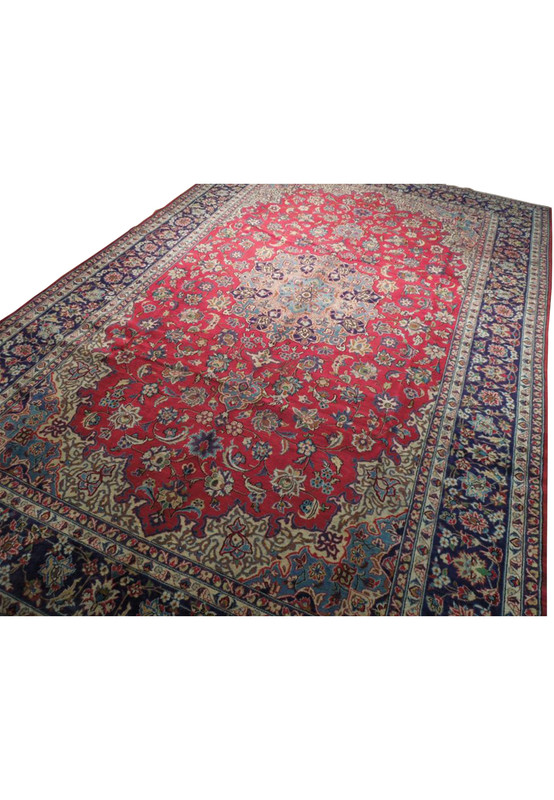 Close-up image of the handcrafted details on a 10x16 Persian Najafabad rug, showcasing the fine craftsmanship