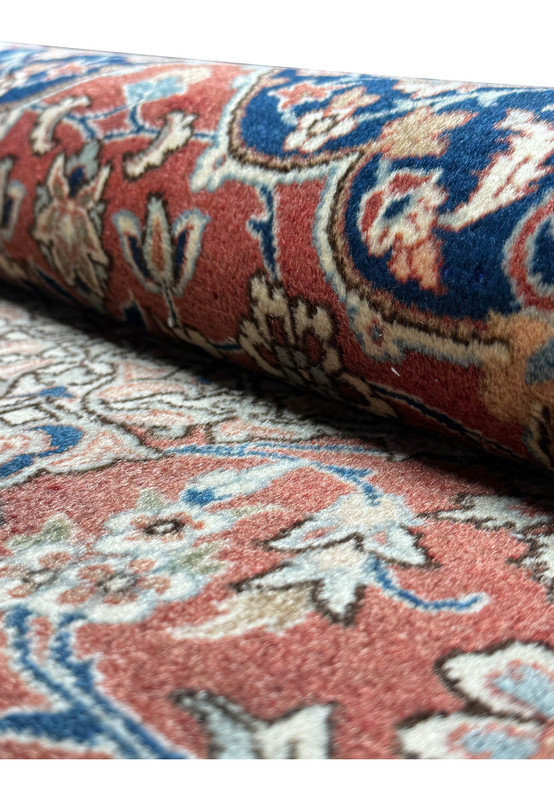 Rolled 3x5 Antique Mashad Rug, illustrating the plush pile and texture of the high-quality wool