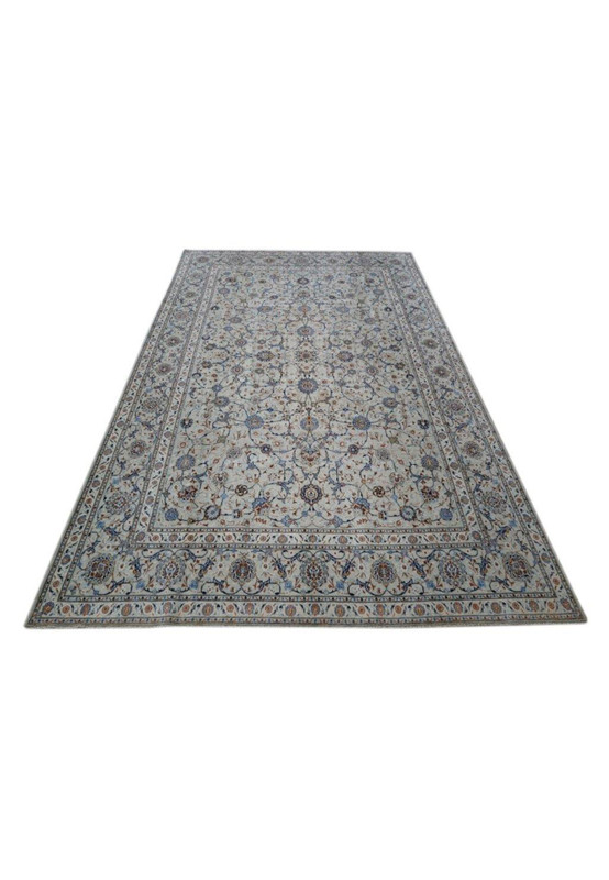 Full-length image of a rare-sized 11 x 18 Persian Kashan rug with a sophisticated all over floral design