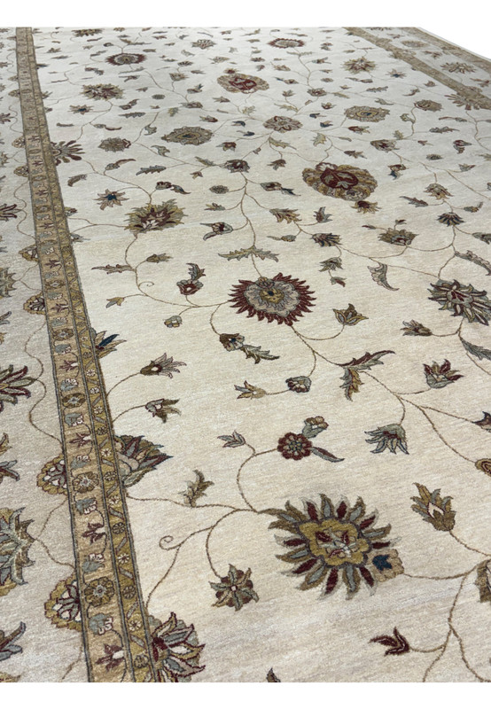 Diagonal full view emphasizing the rug's expansive size and detailed patterns.