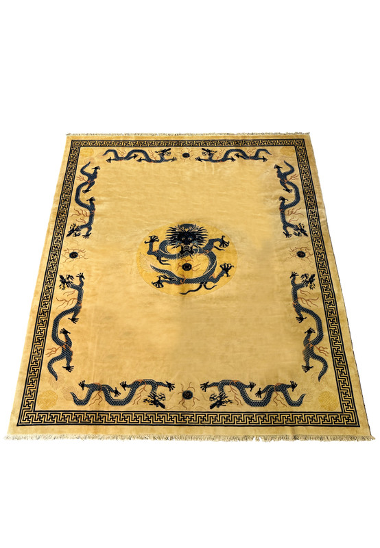 Full display of a handmade Chinese Dragon Rug with beige field and contrasting blue border design