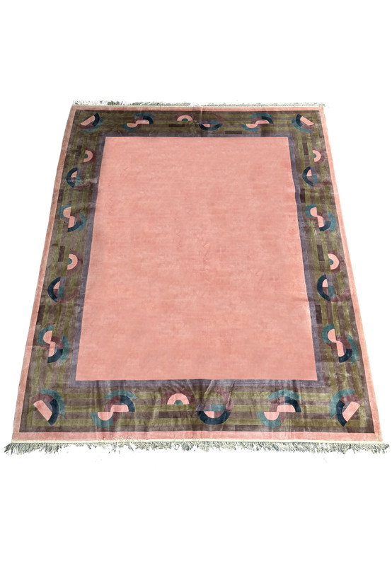 Angled view highlighting the rug's plush texture and intricate border design.