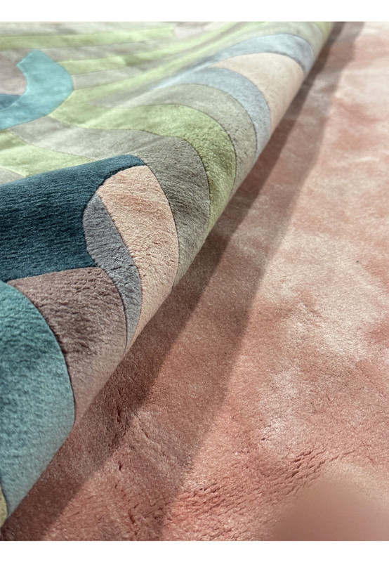 Side view of the rug showcasing the thickness and quality of the silk fibers.