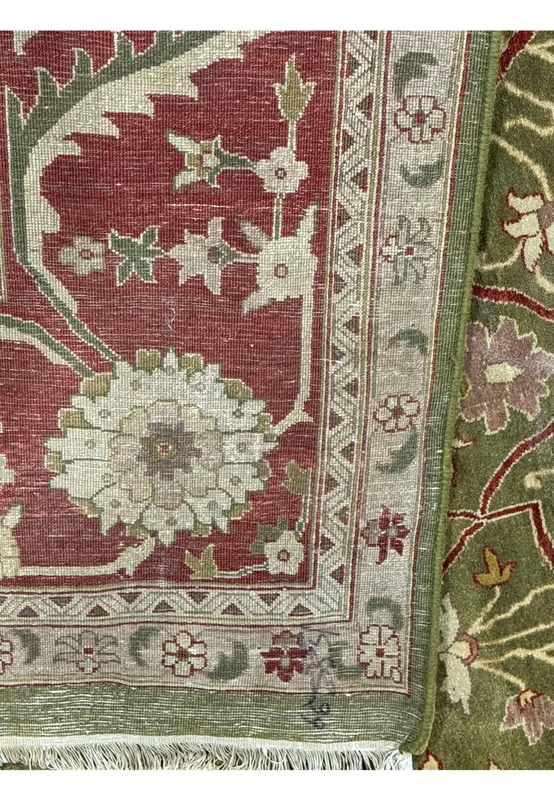 Backside view of a 10x15 Chobi Peshawar rug illustrating the knot density and craftsmanship quality