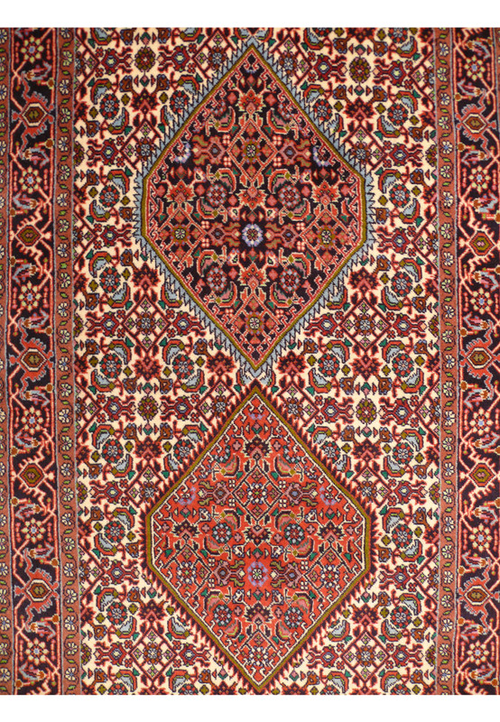 Close-up of the traditional Persian Bijar Runner Rug, highlighting the rich, intricate floral motifs and detailed craftsmanship.