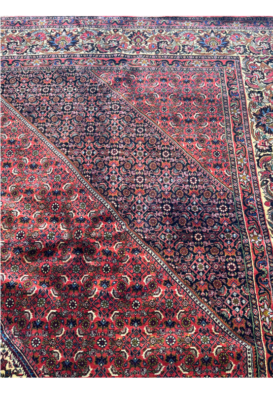 Macro shot of the Bijar Rug’s pile, highlighting the fine knotting and the plush wool texture