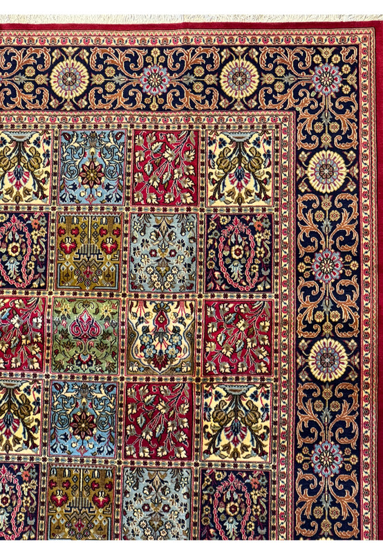 A close look at the intricate weaving and color detail of each panel on a 8 x 11 Persian Qum Kork rug, with floral and geometric designs