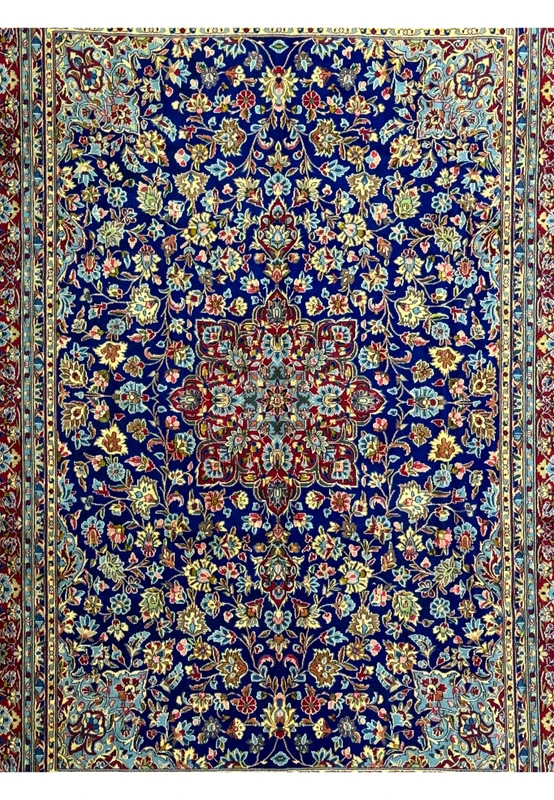 Focused view of the border on a Persian Kerman Rug, emphasizing the complementary floral motifs and the exquisite craftsmanship.