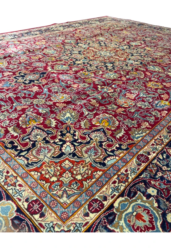 This detailed image captures the elaborate central design of the Persian Mahal rug, emphasizing its potential to be a focal point in any room.