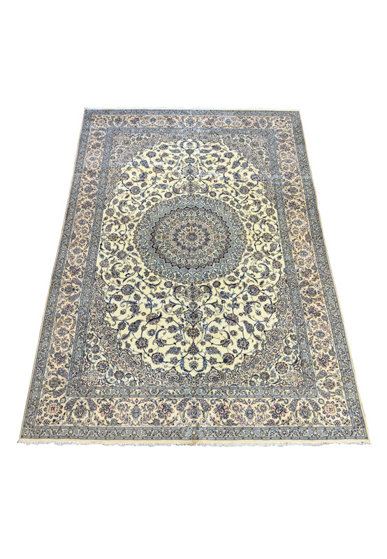 Side angle of a 13 x 20 Persian Nain 9LAA Wool & Silk Rug highlighting its detailed patterns and craftsmanship