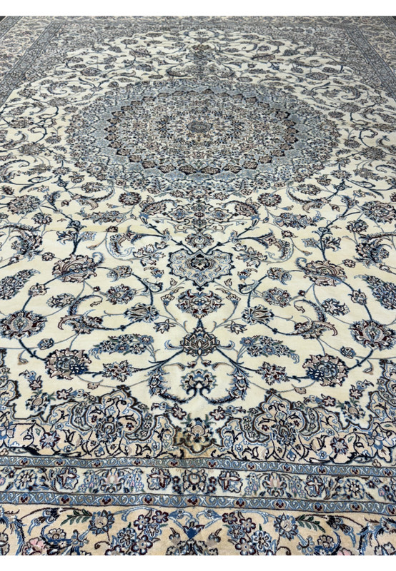 Overview of the Persian Nain 9LAA Wool & Silk Rug showing the detailed floral design.