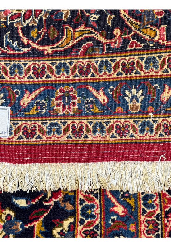 Detailed view of the backside of a Persian Kashan Rug, revealing the knot density and weaving technique.