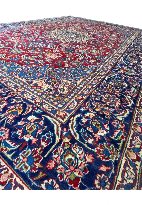 Side view showcasing the plush wool pile of the 9'11 x 12'11 Persian Isfahan Rug.