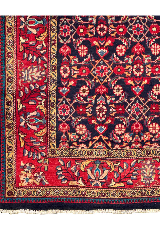 Corner view of the Persian Mahal rug, highlighting the detailed floral motifs.