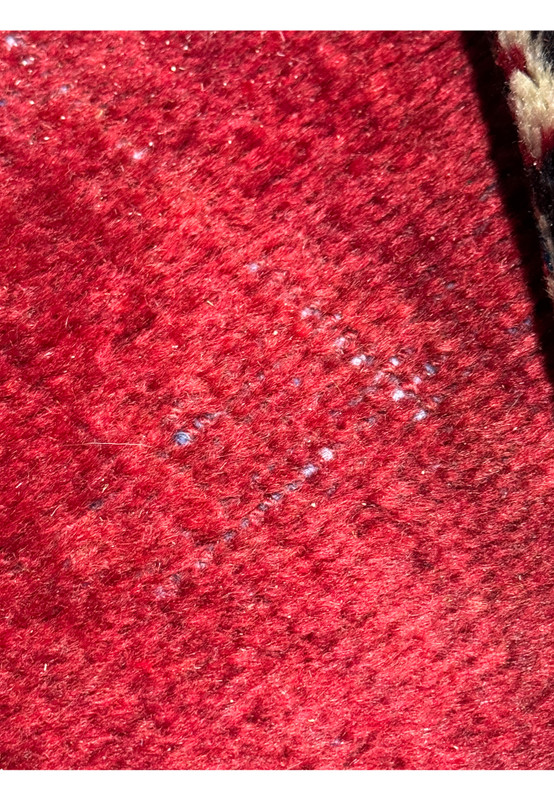 Detail shot of this Mahal Persian Rug 11x13 low pile and distressed spot