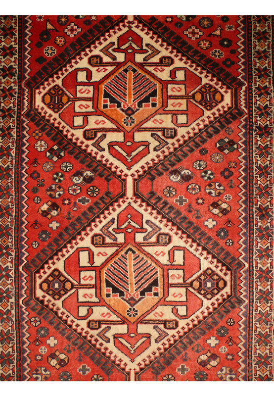 A detailed look at the 3'8" x 10' Persian Bakhtiar runner rug, displaying its beautiful design and vibrant color palette. The intricate patterns and durable wool construction highlight the superior craftsmanship of Bakhtiar weavers.