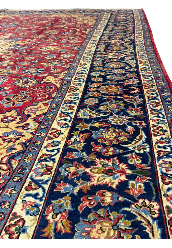 Back of 10'2 x 13'6 Persian Isfahan Rug revealing hand-knotted craftsmanship.