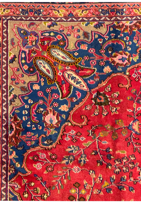 Side view of the Persian Mashad rug, emphasizing the high knot density and luxurious wool texture.