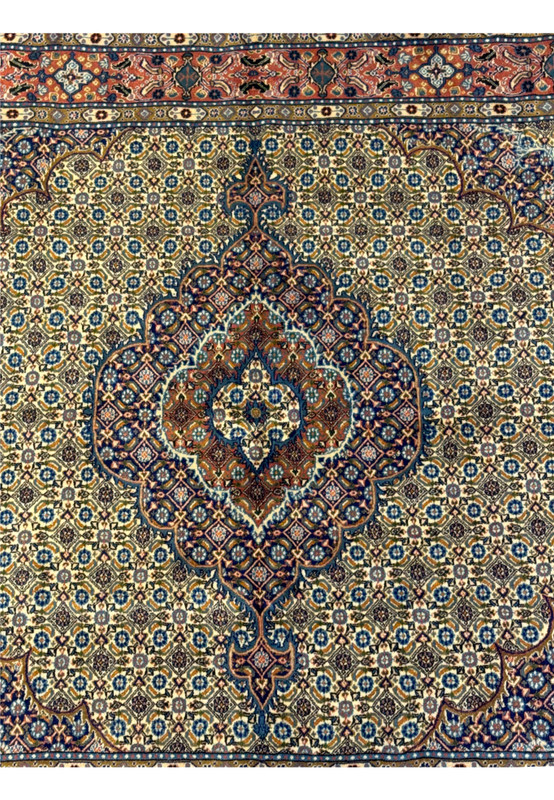 Close-up of the central medallion on the Persian Moud Square Rug, featuring detailed floral motifs and rich color palette