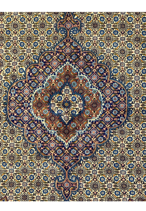 Detail of the hand-woven patterns and natural dye colors on the Persian Moud Square Rug.