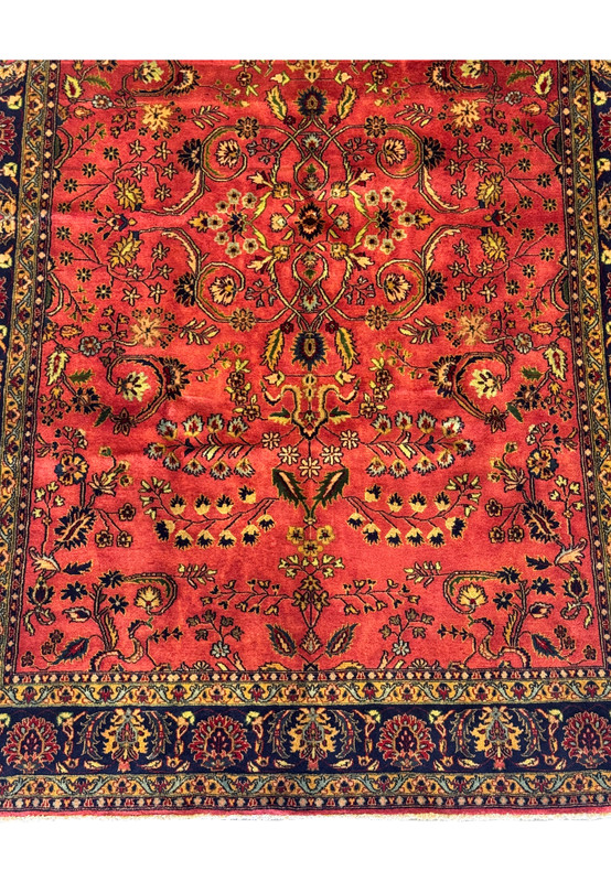 Close-up of the floral motifs on the 6'5 x 9'6 American Sarough Rug.
