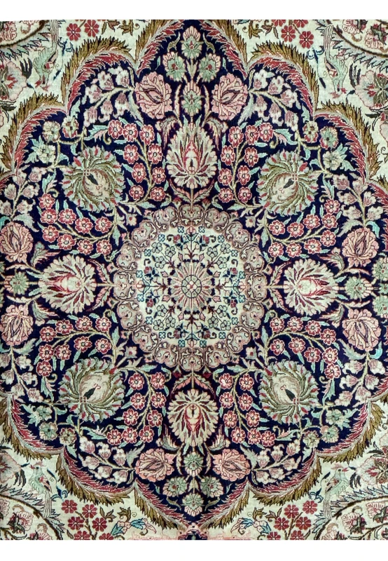 Central medallion of a Persian Tabriz 100% silk rug with intricate floral patterns