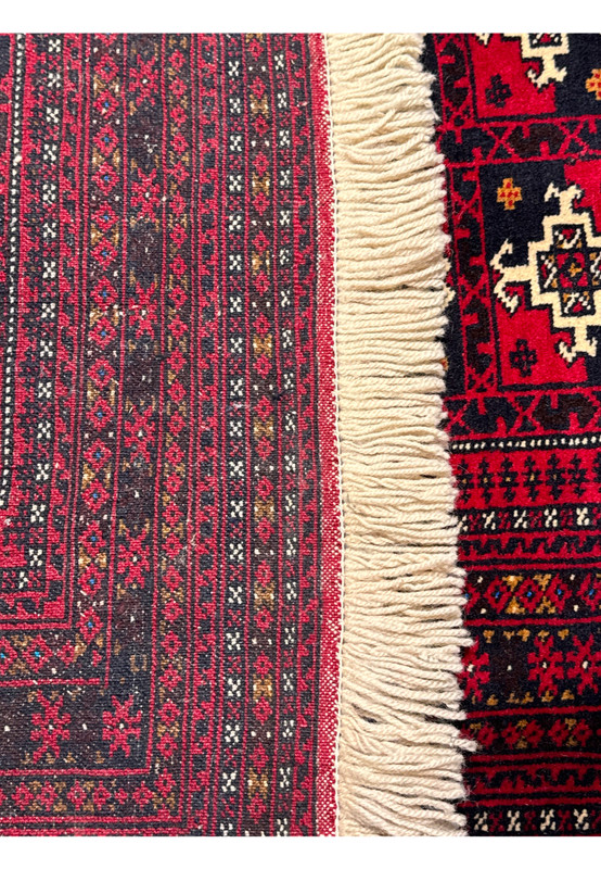 Backside Fringe and edge detail of 3'6 x 4'9 Persian Baluch Rug.