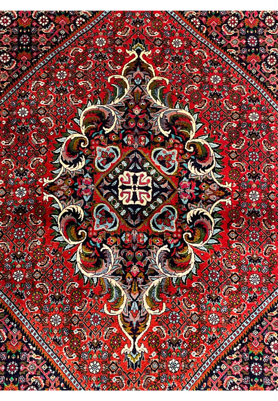 Close-up of central medallion on Persian Bijar Rug showcasing detailed motifs.