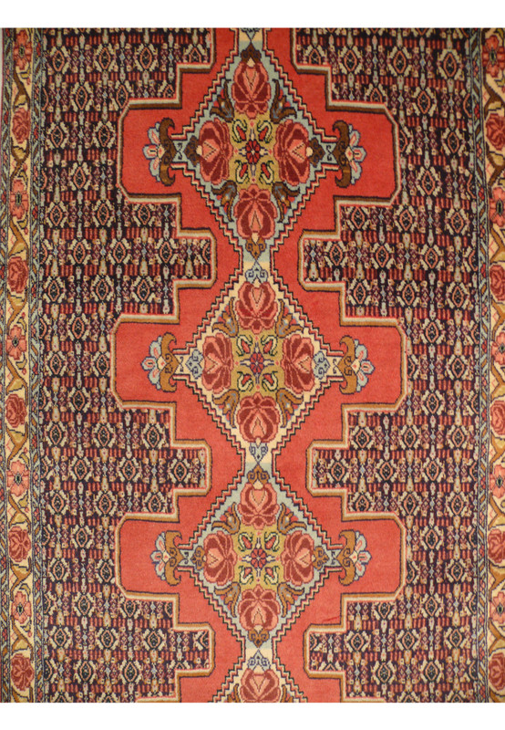 Central field of 3 x 13'3 Persian Senneh Runner with geometric and floral motifs