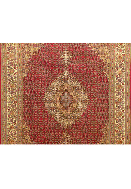 Close-up of the medallion of the 6'8 x 10 Persian Tabriz Mahi Rug, showcasing the intricate floral and geometric patterns.