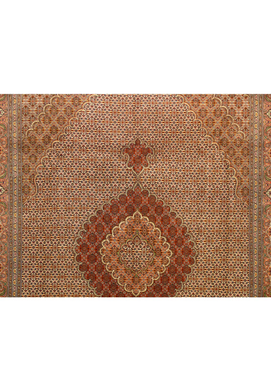 Detailed view of the central field and medallion of the Tabriz Mahi Silk 50 Raj Rug.