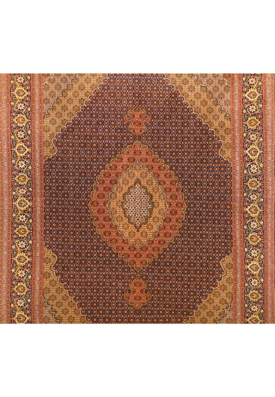 Close-up of the medallion on 6'8" x 9'7" Persian Tabriz Mahi 50 Raj Rug highlighting detailed craftsmanship.