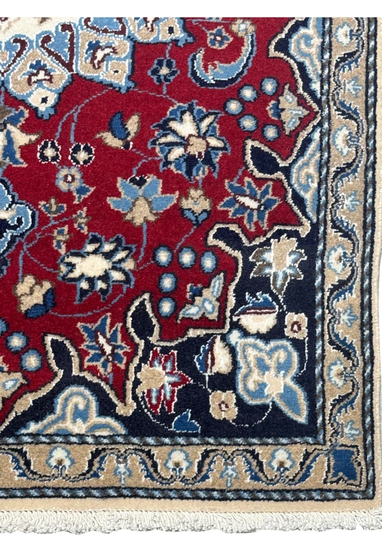 Close-up view of the intricate border and fringe of the 2'10" x 4'5" Red Persian Nain Rug showcasing detailed floral patterns.