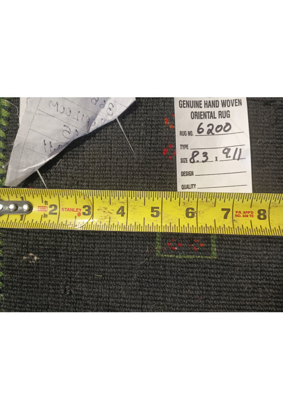 Backside of 8'3" x 9'11" Gabbeh rug showing the intricate weaving and label.