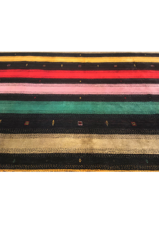 Lower part of 8'3" x 9'11" colorful Gabbeh rug with intricate patterns.