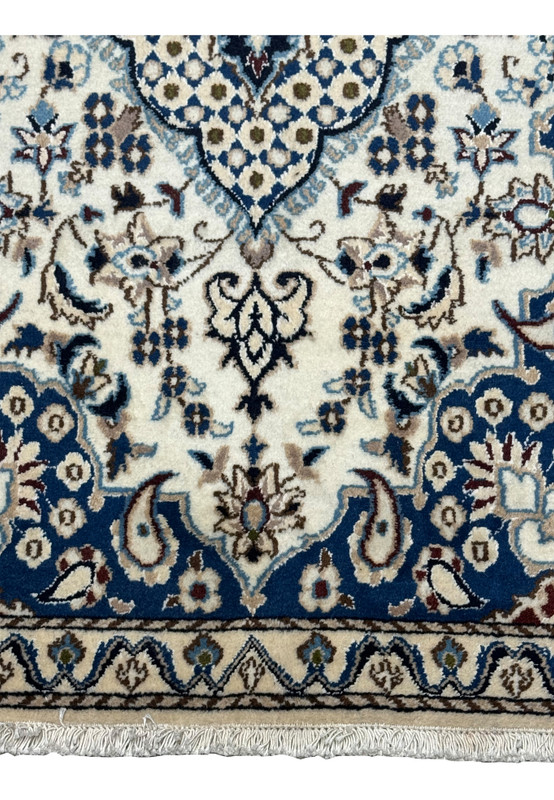 Lower part of 3x4'10" Persian Nain Rug showcasing intricate floral motifs