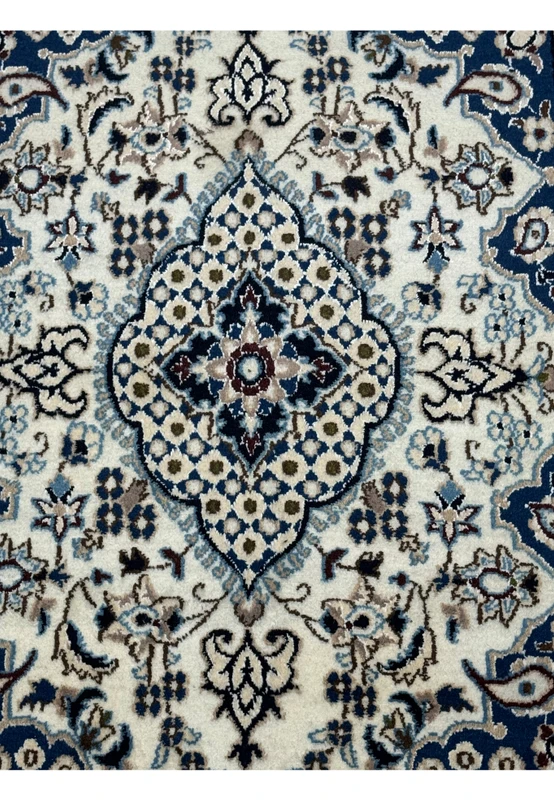 Close-up of medallion design on 3x4'10" Persian Nain Rug