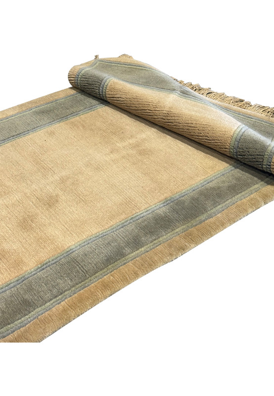 Rolled texture detail of a 2'8" x 28' Nepali runner showing fabric quality.