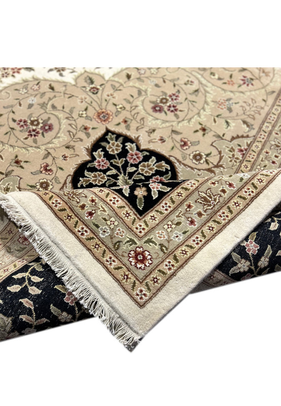 Detailed texture view of a 12'5" x 18' Persian Tabriz Rug, highlighting its intricate weave and quality material.