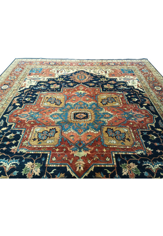 Upper part of 12x15 Serapi Oriental Rug with intricate designs.