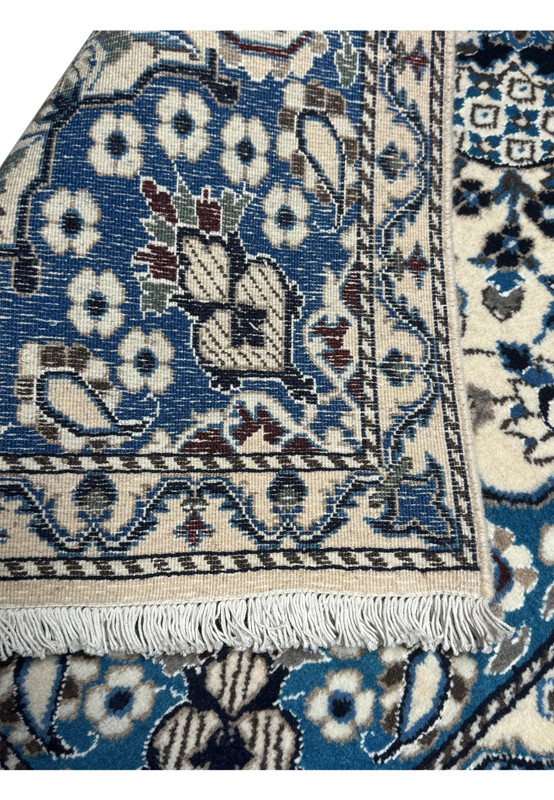 Backside of the 2'9 x 4'7 Persian Nain Rug showing the precision of the hand-knotted weave.