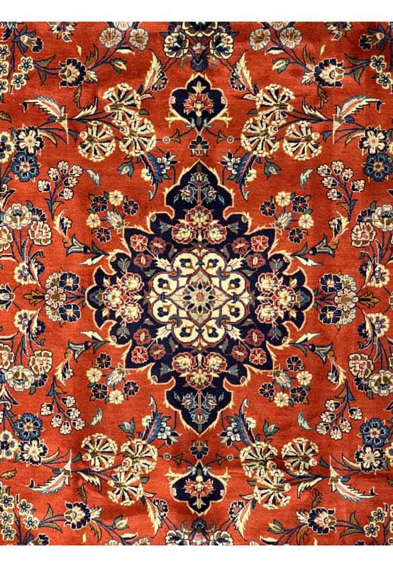 Close-up of the central medallion on the 6'6 x 10'2 Persian Sarough Rug, highlighting intricate floral motifs and fine craftsmanship.