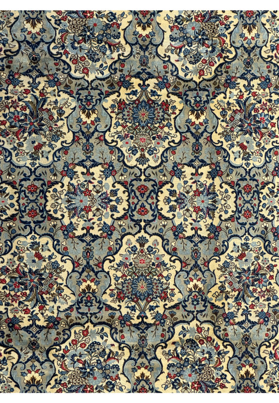 Floral motifs on the 8'2 x 11'6 Persian Kashan Rug, in sky blue and ivory with a red border.