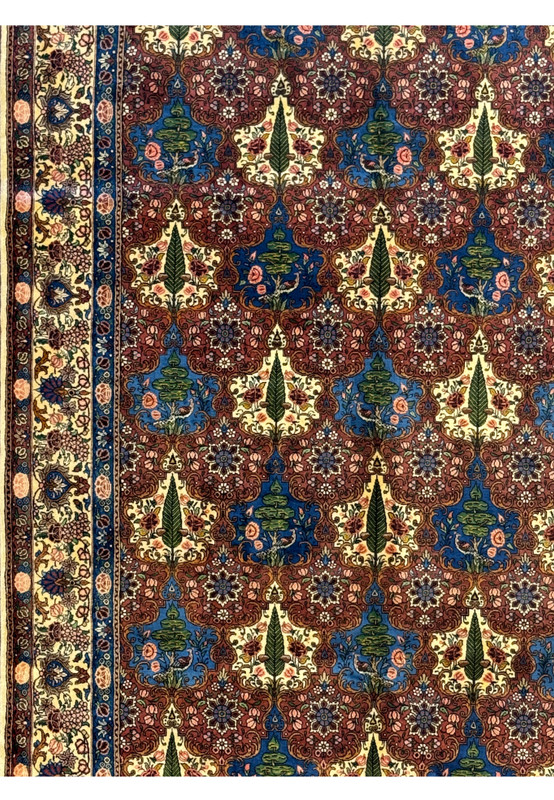 Midfield and border detail of a Persian Bakhtiar Rug, highlighting its intricate floral border and nature-inspired patterns.
