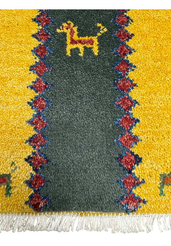Lower edge of the Persian Gabbeh Poshti Rug showing colorful fringe and vibrant wool pile.