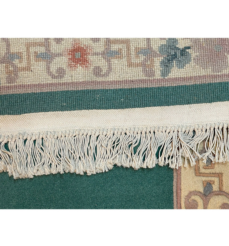 Backside of the Walter Nichols Art Deco Runner showcasing its cotton foundation and durable construction.