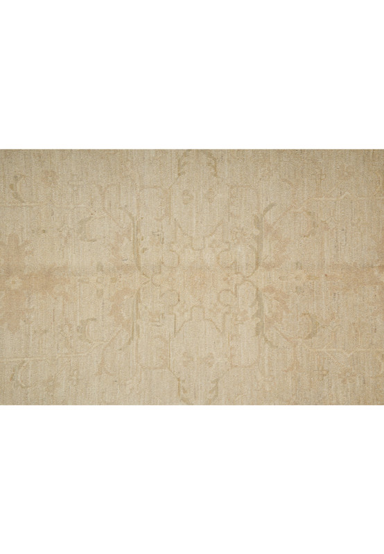 Mid-section of Chobi Ziglar rug highlighting the repeating botanical patterns and subdued vegetable-dyed colors.